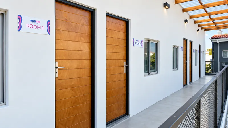 DreamSleep guest room entrances with modern timber doors