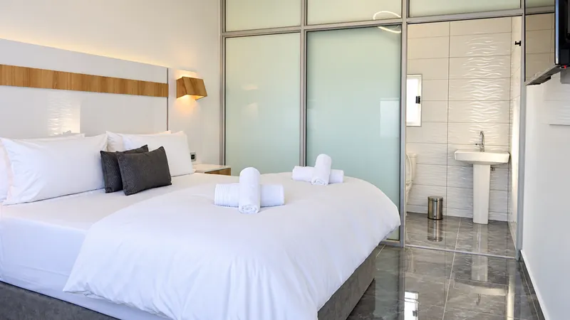 DreamSleep king room with modern en-suite bathroom