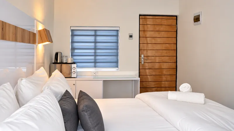 DreamSleep room with king bed, microwave, kettle and private entrance
